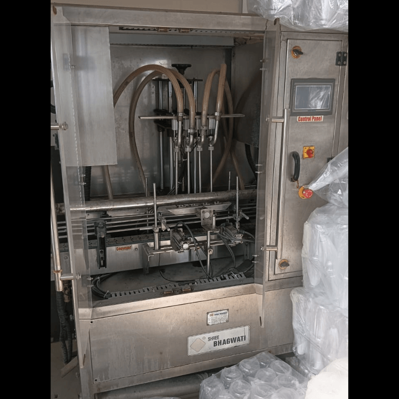 4 Head Automatic Volumatric Liquid Filling Machine