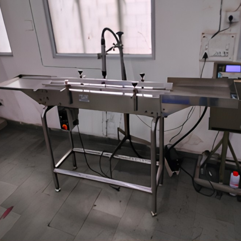 Filling and capping table
