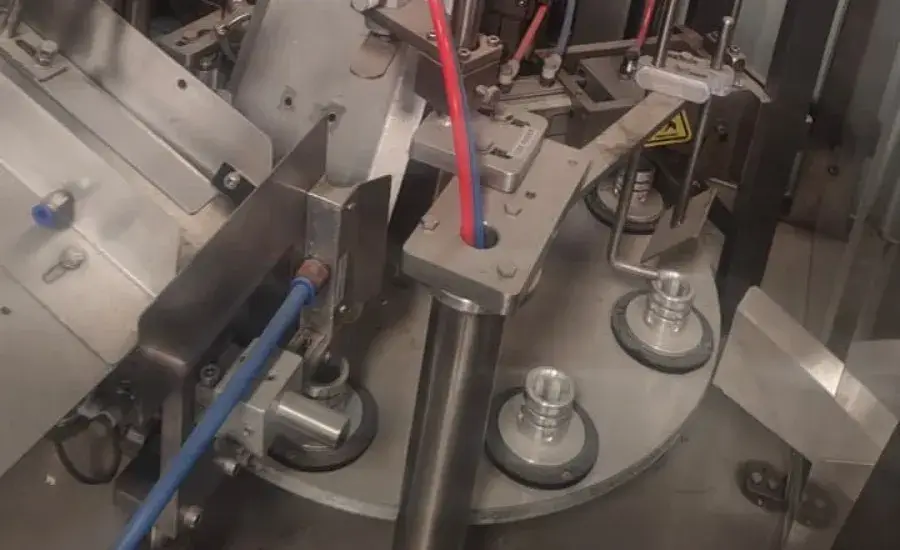 Bhavani Automatic Tube Filling Machine close up of tube loading area
