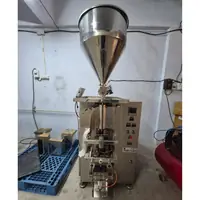 Pouch packing machine with batch coding in the masala processing plant - thumbnail
